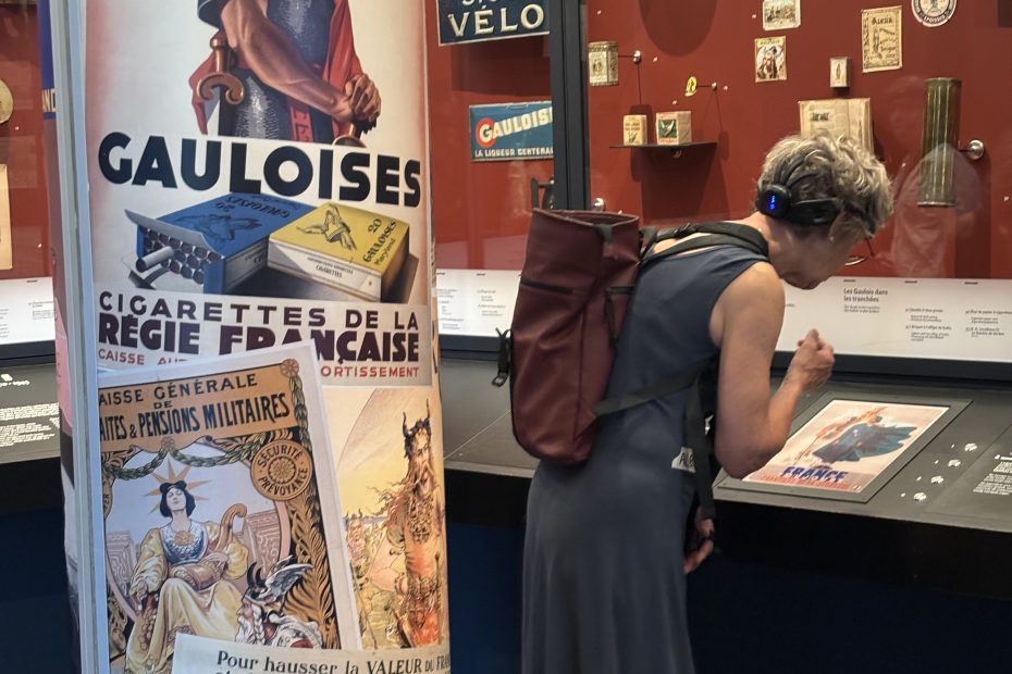 a woman taking a closer look at a museum display.
