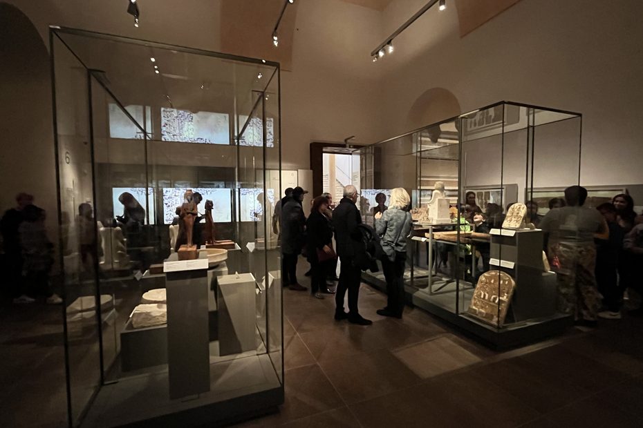 people from different demographics visiting Museo Egizio in Turin's Deir el Medine room
